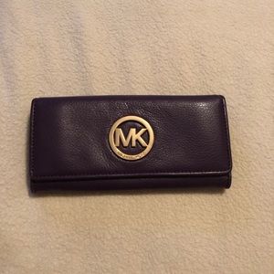 Purple Michael Kors jet set Fulton wallet